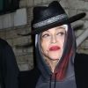 Madonna porte un sweat Orange Mécanique à la sortie de la Howard Gilman Opera House avec Ahlamalik Williams après la dernière représentation de sa tournée "Madame X Tour" à Brooklyn, New York, le 13 octobre 2019.