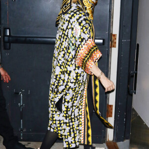 Madonna se cache des photographes à son arrivée au Howard Gilman Opera House pour son concert Madame X à New York.