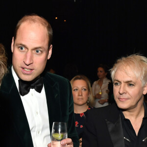 Le prince William, duc de Cambridge entouré de Nick Rhodes et John Taylor du groupe Duran Duran (groupe préféré de la princesse Diana) lors d'un gala à l'occasion du 50ème anniversaire de Centrepoint, à la Roundhouse de Camden, dans le nord de Londres, le 13 novembre 2019.