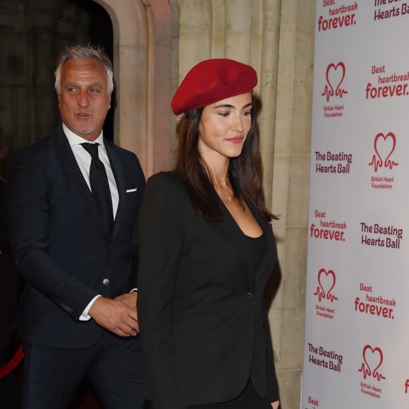 David Ginola et sa compagne Maeva Denat arrivent à la soirée "The Beating Hearts Ball" à Londres, le 27 février 2019.