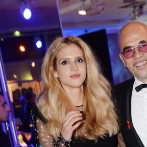 Pascal Obispo et sa femme Julie Hantson à la 17ème édition du "Dîner de la mode du Sidaction" au Pavillon d'Armenonville à Paris, France, le 24 janvier 2019. Depuis 2003, ce dîner permet de montrer l'engagement indéfectible du monde de la mode en faveur de la lutte contre le sida. © Rachid Bellak/Bestimage