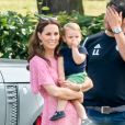 Kate Middleton, duchesse de Cambridge et le prince Louis de Cambridge lors d'un match de polo de bienfaisance King Power Royal Charity Polo Day à Wokinghan, comté de Berkshire, Royaume Uni, le 10 juillet 2019.