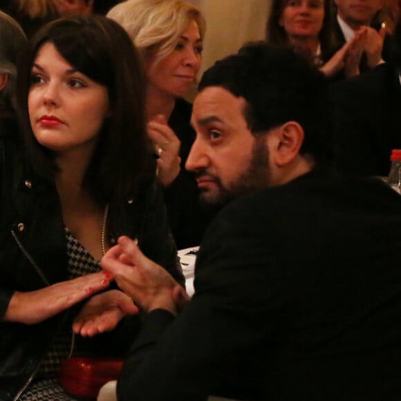 Exclusif - Cyril Hanouna et sa compagne Emilie - Soiree annuelle de la FIDH (Federation Internationale des Droits de l'homme) et 65eme anniversaire de la Declaration universelle des Droits de l'Homme a l'Hotel de Ville de Paris le 10 decembre 2013.