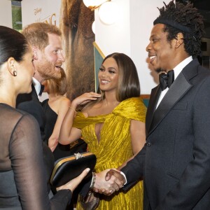 Le prince Harry, duc de Sussex, et Meghan Markle, duchesse de Sussex, avec Jay-Z et sa femme Beyonce Knowles à la première du film "Le Roi Lion" au cinéma Odeon Luxe Leicester Square à Londres, le 14 juillet 2019.