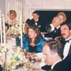 Lady Diana, le président américain Ronald Reagan, John Travolta et Tom Selleck lors du dîner d'Etat à la Maison-Blanche en 1985.