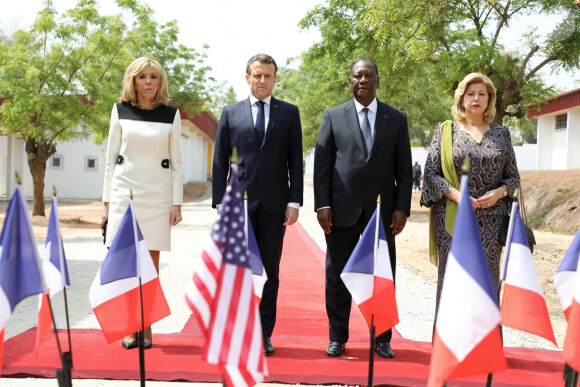 Alassane Ouattara, président de la République de Côte d'Ivoire, Dominique Ouattara, Première dame, Emmanuel Macron, président de la République française, Brigitte Macron, Première dame - Déplacement en Côte d'Ivoire - Hommage aux soldats français et américains morts dans l'exercice de leur mission en Côte D'ivoire le 6.11.2004, Lycée Descarte à Bouaké, le 22 décembre 2019. © Dominique Jacovides / Bestimage