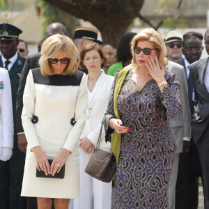 Dominique Ouattara, Première dame, Florence Parly, ministre des Armées, Brigitte Macron, Première dame - Déplacement en Côte d'Ivoire - Hommage aux soldats français et américains morts dans l'exercice de leur mission en Côte D'ivoire le 6.11.2004, Lycée Descarte à Bouaké, le 22 décembre 2019. © Dominique Jacovides / Bestimage