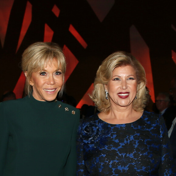 Dominique Ouattara, Première dame de Côte d'Ivoire, Brigitte Macron, Première dame de France - Déplacement en Côte d'Ivoire - Dîner d'Etat offert par le président de la République de Côte d'Ivoire et sa femme en l'honneur du président de la République française et sa femme au Sofitel Hôtel Ivoire à Abidjan le 21 décembre 2019. © Dominique Jacovides / Bestimage