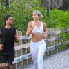 Exclusif - Wilmer Valderrama et sa compagne Amanda Pacheco font un jogging romantique à Miami le 14 juillet 2019.