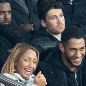 Tony Yoka et sa femme Estelle Mossely (enceinte de son deuxième enfant) de nouveau ensemble dans les tribunes lors du match de Ligue 1 opposant le Paris Saint-Germain à l'AS Monaco au Parc des Princes à Paris, France, le 12 janvier 2020. Le PSG fait match nul face à l'AS Monaco (3-3).