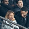 Tony Yoka et sa femme Estelle Mossely (enceinte de son deuxième enfant) de nouveau ensemble dans les tribunes lors du match de Ligue 1 opposant le Paris Saint-Germain à l'AS Monaco au Parc des Princes à Paris, France, le 12 janvier 2020. Le PSG fait match nul face à l'AS Monaco (3-3).