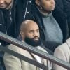 Tony Yoka et sa femme Estelle Mossely (enceinte de son deuxième enfant) de nouveau ensemble dans les tribunes lors du match de Ligue 1 opposant le Paris Saint-Germain à l'AS Monaco au Parc des Princes à Paris, France, le 12 janvier 2020. Le PSG fait match nul face à l'AS Monaco (3-3).