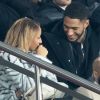 Tony Yoka et sa femme Estelle Mossely (enceinte de son deuxième enfant) de nouveau ensemble dans les tribunes lors du match de Ligue 1 opposant le Paris Saint-Germain à l'AS Monaco au Parc des Princes à Paris, France, le 12 janvier 2020. Le PSG fait match nul face à l'AS Monaco (3-3).