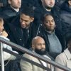 Tony Yoka et sa femme Estelle Mossely (enceinte de son deuxième enfant) de nouveau ensemble dans les tribunes lors du match de Ligue 1 opposant le Paris Saint-Germain à l'AS Monaco au Parc des Princes à Paris, France, le 12 janvier 2020. Le PSG fait match nul face à l'AS Monaco (3-3).