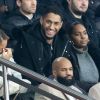 Tony Yoka et sa femme Estelle Mossely (enceinte de son deuxième enfant) de nouveau ensemble dans les tribunes lors du match de Ligue 1 opposant le Paris Saint-Germain à l'AS Monaco au Parc des Princes à Paris, France, le 12 janvier 2020. Le PSG fait match nul face à l'AS Monaco (3-3).