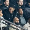 Tony Yoka et sa femme Estelle Mossely (enceinte de son deuxième enfant) de nouveau ensemble dans les tribunes lors du match de Ligue 1 opposant le Paris Saint-Germain à l'AS Monaco au Parc des Princes à Paris, France, le 12 janvier 2020. Le PSG fait match nul face à l'AS Monaco (3-3).