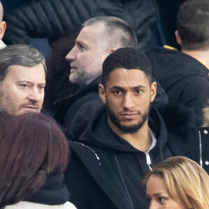 Tony Yoka et sa femme Estelle Mossely (enceinte de son deuxième enfant) de nouveau ensemble dans les tribunes lors du match de Ligue 1 opposant le Paris Saint-Germain à l'AS Monaco au Parc des Princes à Paris, France, le 12 janvier 2020. Le PSG fait match nul face à l'AS Monaco (3-3).