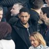 Tony Yoka et sa femme Estelle Mossely (enceinte de son deuxième enfant) de nouveau ensemble dans les tribunes lors du match de Ligue 1 opposant le Paris Saint-Germain à l'AS Monaco au Parc des Princes à Paris, France, le 12 janvier 2020. Le PSG fait match nul face à l'AS Monaco (3-3).