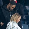 Tony Yoka et sa femme Estelle Mossely (enceinte de son deuxième enfant) à la fin du match de Ligue 1 opposant le Paris Saint-Germain à l'AS Monaco au Parc des Princes à Paris, France, le 12 janvier 2020. Le PSG fait match nul face à l'AS Monaco (3-3).