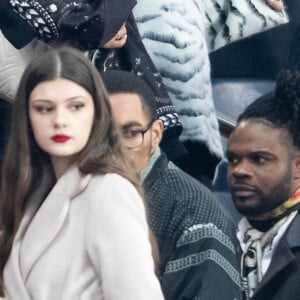 Tony Yoka et sa femme Estelle Mossely (enceinte de son deuxième enfant) de nouveau ensemble dans les tribunes lors du match de Ligue 1 opposant le Paris Saint-Germain à l'AS Monaco au Parc des Princes à Paris, France, le 12 janvier 2020. Le PSG fait match nul face à l'AS Monaco (3-3).