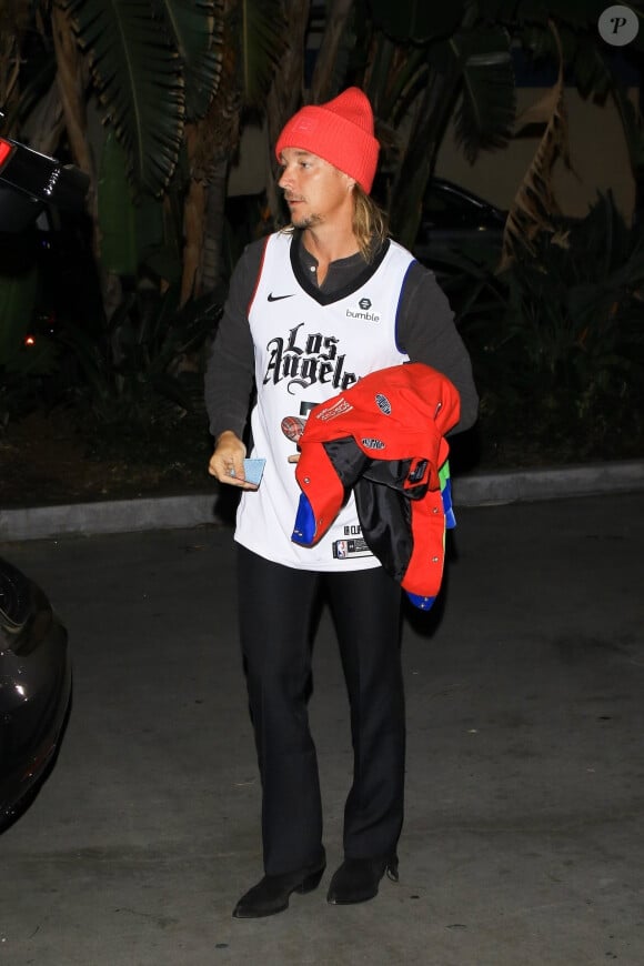 Diplo arrive au Staples Center pour assister au match des Lakers contre les Clippers, à Los Angeles, le 25 décembre 2019.