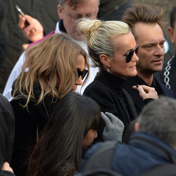 Laeticia Hallyday, ses filles Joy et Jade, Laura Smet, David Hallyday - Sorties de l'église de la Madeleine après les obsèques de Johnny Hallyday à Paris le 9 décembre 2017. © Veeren / Bestimage