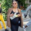 Christina Milian, enceinte, a déjeuné avec son amie Nicole Williams au restaurant Ivy à Los Angeles le 14 janvier 2020.