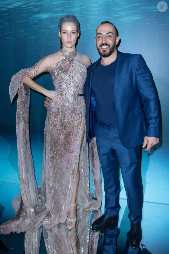 Maëva Coucke et le créateur Ziad Nakad lors du défilé Ziad Nakad (collection Couture printemps-été 2020) à l'hôtel Intercontinental Paris Le Grand. Paris, le 22 janvier 2020.