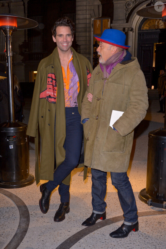 Mika et Christian Louboutin lors du défilé Haute Couture Valentino printemps-été 2020 à Paris le 22 janvier 2020.
