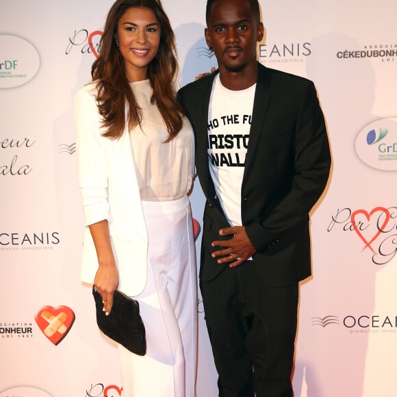 Black M (Alpha Diallo) et sa femme Léa - Personnalités au gala "Par Coeur" pour les 10 ans de l'association "Cekedubonheur" au pavillon d'Armenonville à Paris. Le 24 septembre 2015.