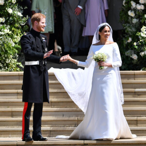 Le prince Harry, duc de Sussex, et Meghan Markle, duchesse de Sussex, à la sortie de chapelle St. George au château de Windsor - Sortie après la cérémonie de mariage du prince Harry et de Meghan Markle en la chapelle Saint-George au château de Windsor, Royaume Uni, le 19 mai 2018.