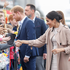 Le prince Harry, duc de Sussex, et Meghan Markle, duchesse de Sussex, ont été accueillis par une foule de supporters au Viaduct Harbour à Auckland, Nouvelle-Zélande, le 30 octobre 2018.