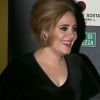 La chanteuse Adele rencontre ses fans lors de son arrivée à Milan en Italie le 4 décembre 2015.