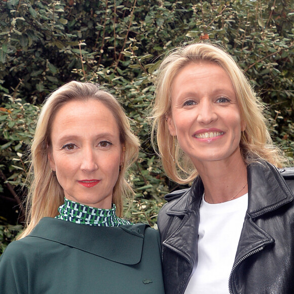 Audrey Lamy et sa soeur Alexandra Lamy - People au défilé Lacoste Collection Prêt-à-Porter Printemps/Eté 2020 lors de la Fashion Week de Paris, le 1er octobre 2019. © Veeren Ramsamy-Christophe Clovis/Bestimage