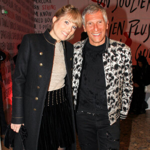 Nagui et sa femme Mélanie Page lors du vernissage de l'exposition consacrée à l'oeuvre et l'imaginaire de Christian Louboutin "l'Exhibitionniste' (L'Exibition[niste]) au Palais de la Porte Dorée, à Paris, France, le 24 février 2020. © Philippe Baldini/Bestimage