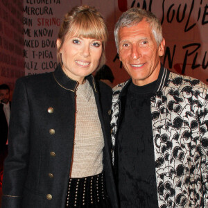 Nagui et sa femme Mélanie Page participent au vernissage de l'exposition consacrée à l'oeuvre et l'imaginaire de Christian Louboutin "l'Exhibitionniste' (L'Exibition[niste]) au Palais de la Porte Dorée, à Paris, France, le 24 février 2020. © Philippe Baldini/Bestimage