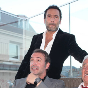 Exclusif - Gilles Lellouche, Jean Dujardin, Jean-Paul Belmondo - Soirée de Gala caritative au profit de l'association "Des Cantines Scolaires pour les Enfants du Sahel" à Cannes au Five Seas Hotel, le 31 mai 2014.