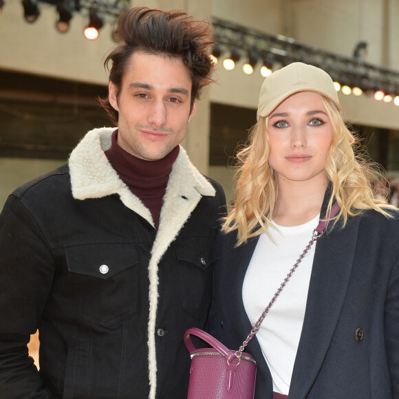 Félix Cordier et Chloé Jouannet assistent au défilé Lacoste, collection prêt-à-porter automne-hiver 2020-2021 au Tennis Club de Paris. Paris, le 3 mars 2020. © Veeren Ramsamy-Christophe Clovis /Bestimage