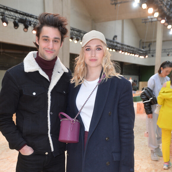 Félix Cordier et Chloé Jouannet assistent au défilé Lacoste, collection prêt-à-porter automne-hiver 2020-2021 au Tennis Club de Paris. Paris, le 3 mars 2020. © Veeren Ramsamy-Christophe Clovis /Bestimage