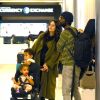 Exclusif - Gary Clark Jr., sa femme Nicole Trunfio enceinte et leurs enfants, Gia et Zion arrivent à l'aéroport LAX de Los Angeles, le 15 janvier 2020.