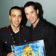 Emmanuel Moire et Merwan Rim après la dernière représentation du "Roi Soleil. Ils fêtent le double disque de platine au VIP Room (Paris) le 8 janvier 2006.