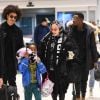 Madonna, son nouveau compagnon Ahlamalik Williams et ses enfants arrivent à l'aéroport JFK à New York, le 27 décembre 2019.