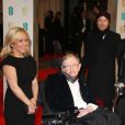 Stephen Hawking et sa fille Lucy Hawking - Cérémonie des "British Academy of Film and Television Arts" (BAFTA) 2015 au Royal Opera House à Londres, le 8 février 2015.  "British Academy of Film and Television Arts" (BAFTA) 2015 held at Royal Opera House, Covent Garden, London. February 8th, 2015.08/02/2015 - Londres