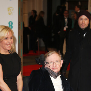 Stephen Hawking et sa fille Lucy Hawking - Cérémonie des "British Academy of Film and Television Arts" (BAFTA) 2015 au Royal Opera House à Londres, le 8 février 2015.  "British Academy of Film and Television Arts" (BAFTA) 2015 held at Royal Opera House, Covent Garden, London. February 8th, 2015.08/02/2015 - Londres