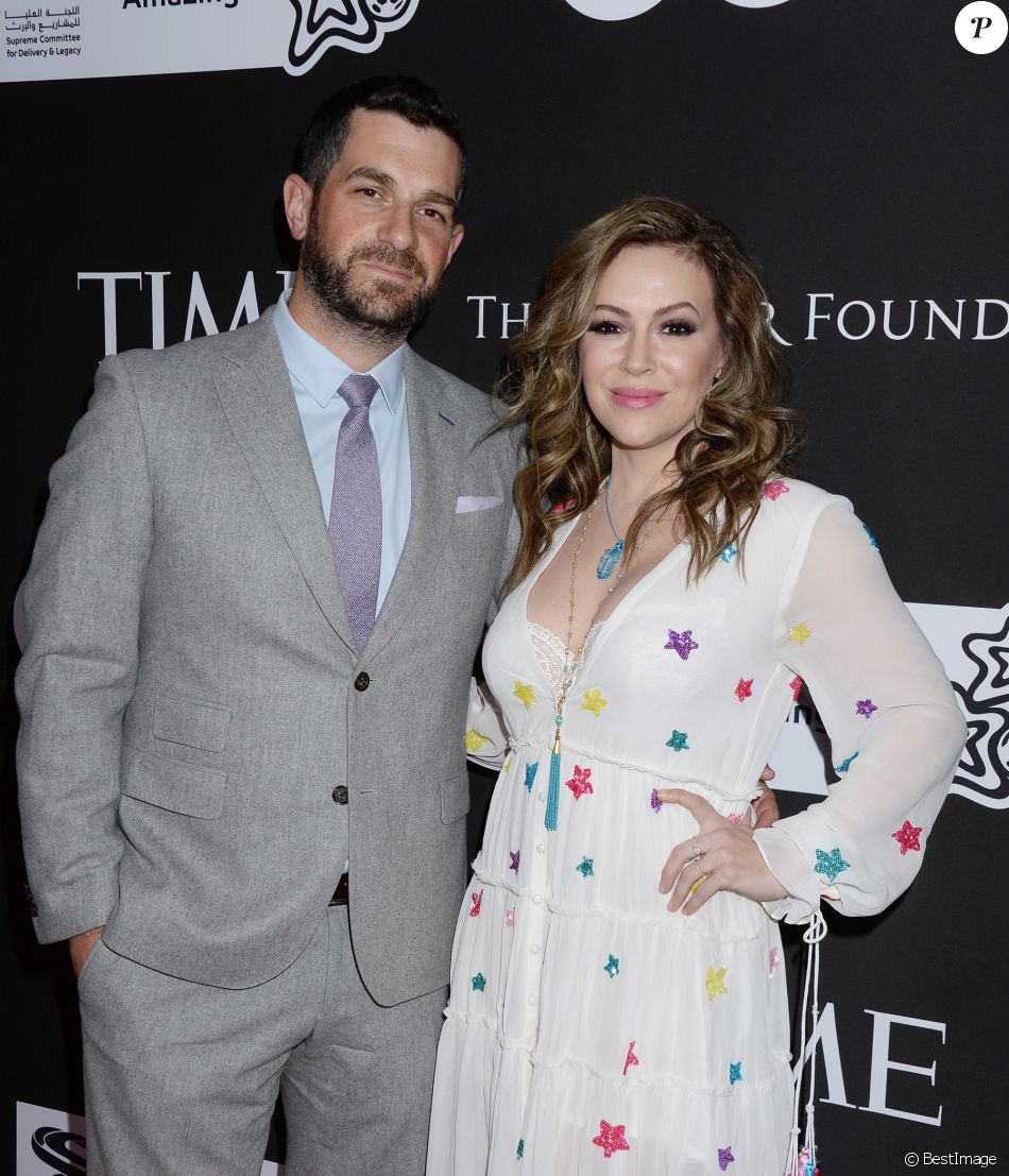 Alyssa Milano et son mari Dave Bugliari au photocall du 10ème