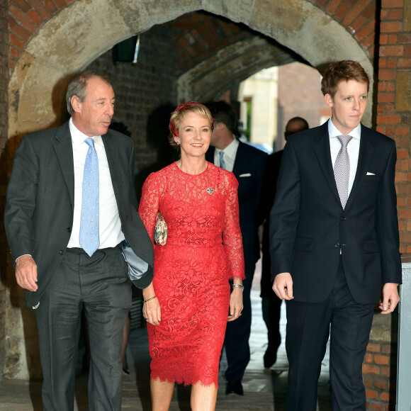 Michael Samuel, Julia Samuel (marraine), Hugh Earl Grosvenor (parrain) - Le prince William, duc de Cambridge, et Kate Catherine Middleton, duchesse de Cambridge, ont baptise leur fils, le prince George de Cambridge, en la chapelle royale du palais St James a Londres. Le 23 octobre 2013