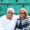 Dominique Strauss Kahn et Myriam L'Aouffir dans les tribunes des Internationaux de France de tennis de Roland Garros le 30 mai 2015.