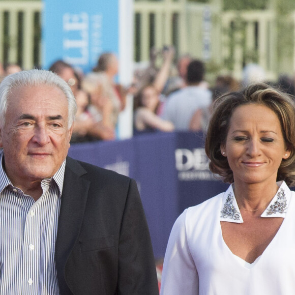 Dominique Strauss-Kahn et Myriam L'Aouffir - Avant-première du film "Sin City" lors du 40ème festival du cinéma américain de Deauville, le 13 septembre 2014.