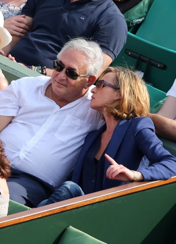 Dominique Strauss Kahn et Myriam L'Aouffir - People aux Internationaux de France de tennis de Roland Garros le 8 juin 2013.