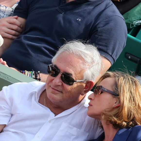 Dominique Strauss Kahn et Myriam L'Aouffir - People aux Internationaux de France de tennis de Roland Garros le 8 juin 2013.